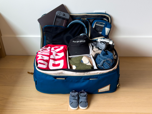 dad hospital bag checklist items packed in duffel bag